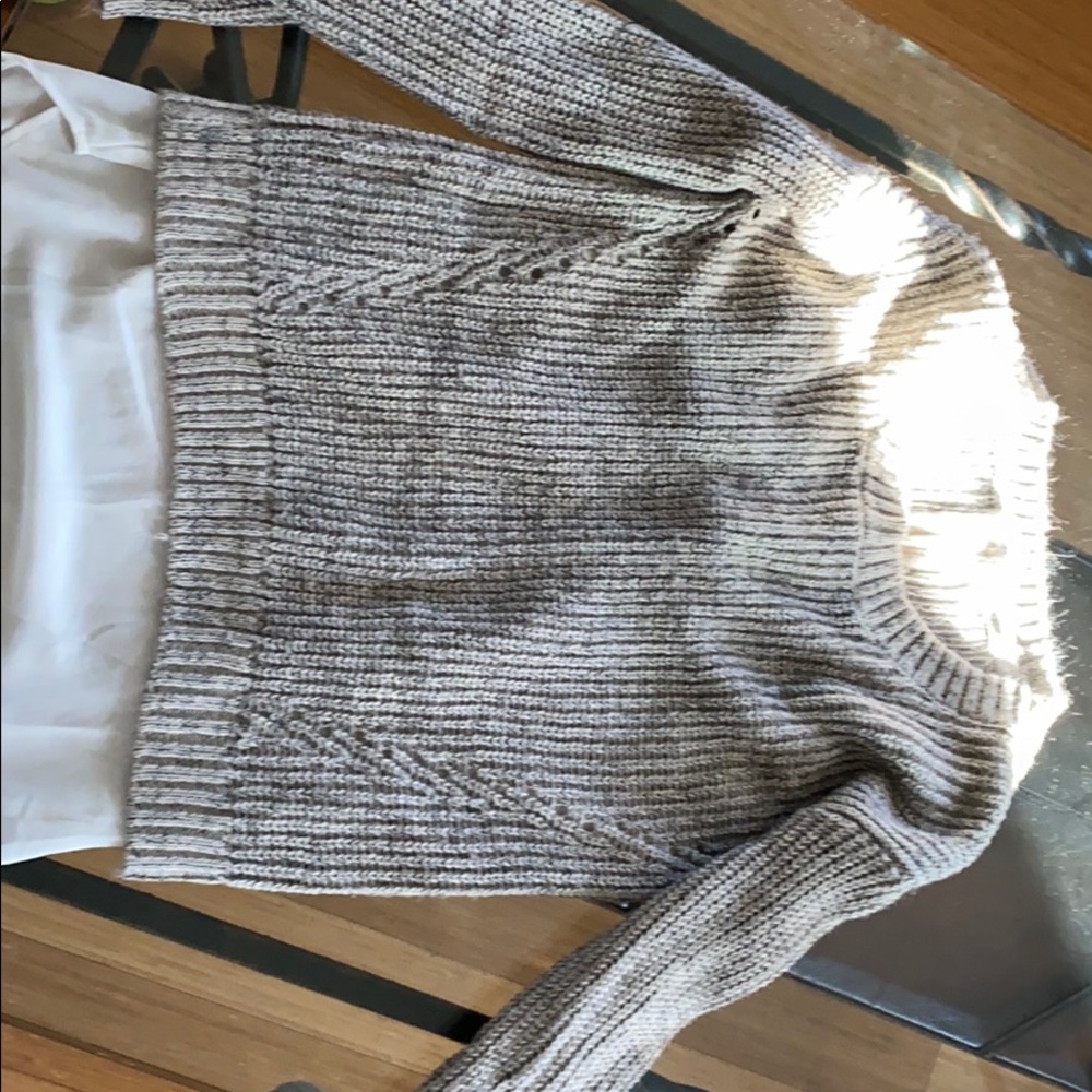 Sweater with working zipper detail on the back